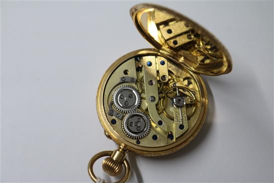 An 18ct gold and enamel half hunter fob watch.